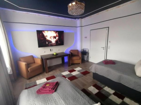 Best-Preis -Gold Suite- mit Netflix, Self-Check-In, eBike Ladestation, Fahrradraum, WLAN, Netflix und Massagesessel - direkt am Elberadweg im Herzen von Wittenberge, Wittenberge